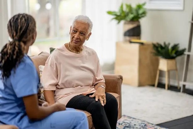 A-senior-sits-with-a-home-care-nurse-to-discuss-health-concerns-(1).jpg A-senior-sits-with-a-home-care-nurse-to-discuss-health-concerns-(1).jpg