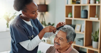 personal-care-nurse-giving-elderly-man-haircut-(2).png