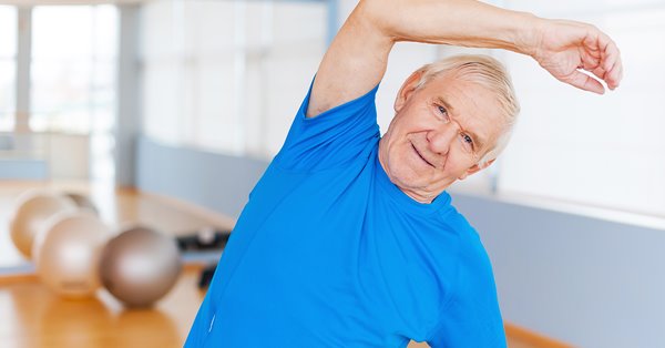 Senior man stretching and exercising