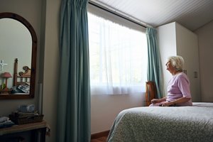 bigstock-A-depressed-elderly-widow-sitt-64804489.jpg