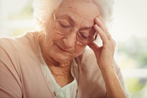bigstock-Elderly-woman-with-headache-at-117100061.jpg