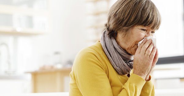 Woman suffering during cold and flu season