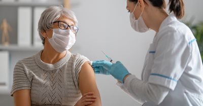 Woman-getting-a-vaccine.jpg