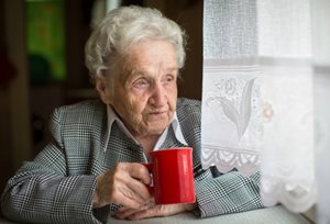 bigstock-Elderly-woman-drinking-tea-sit-133151966(1).jpg