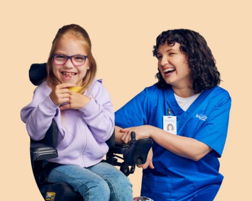 A diverse group of healthcare professionals engaged in a conversation with a patient with developmental disabilities. They are gathered around a table, showing empathetic body language and active listening. The image represents the importance of empathy in healthcare and creating a supportive environment for patients with developmental disabilities.